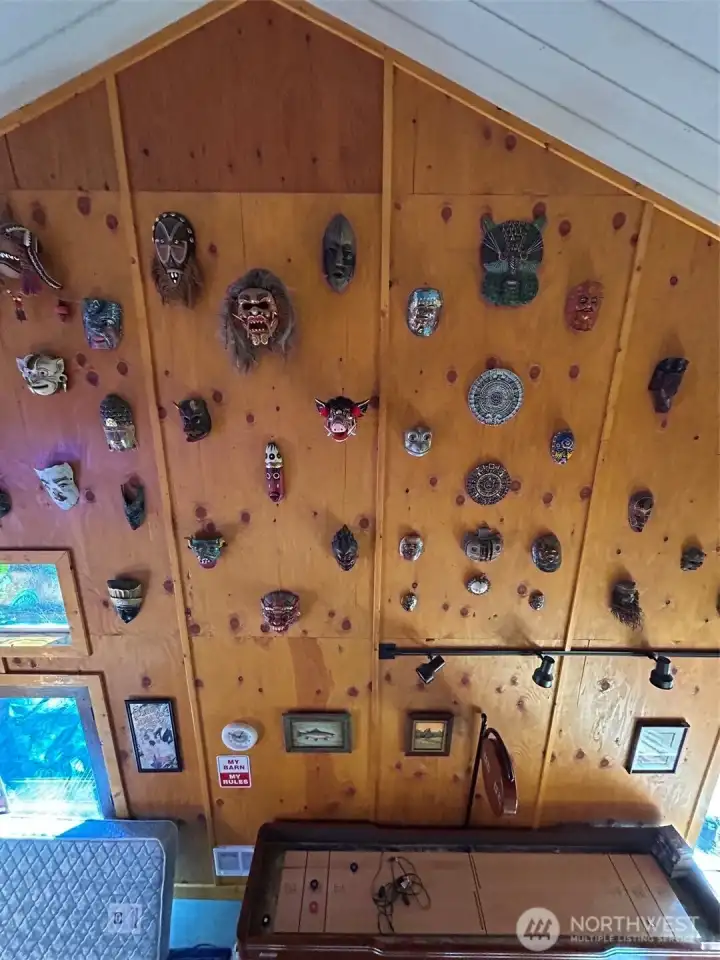 Shuffle board and wall of masks