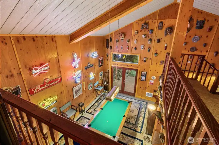 Party barn pool table, neon and mask wall from loft Party barn pool table, neon and mask wall from loft