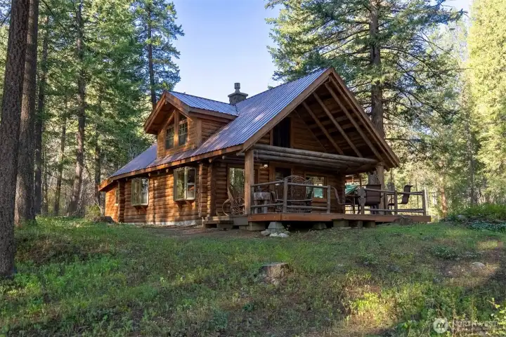 A well-built log cabin in the woods on Twisp River - charming, cozy, nostalgic, and peaceful are just a few of the words that come to mind to describe this place.