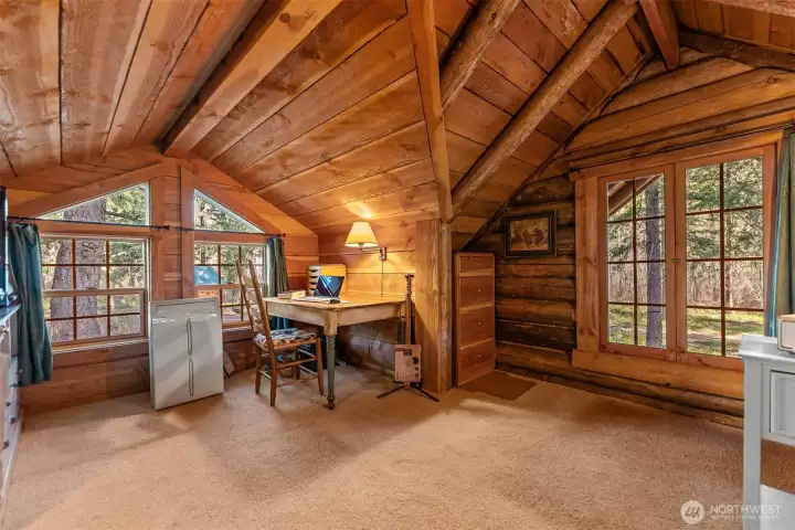 This nook in the upstairs bedroom serves as an office.