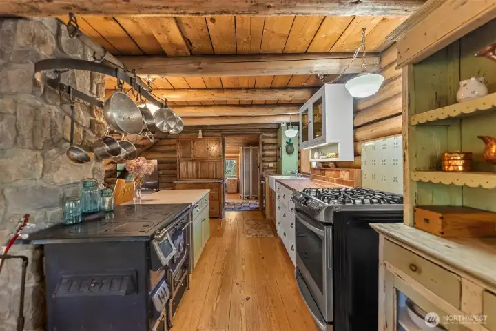 Old wood cook stove is for ambiance and storage - it is not currently hooked up, but all the parts to do so are in the barn.