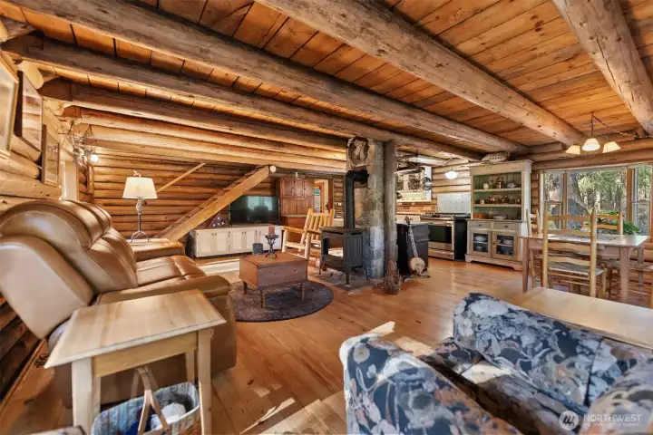 This space invites gatherings and shared meals that flow out onto the porch, and also curling up in front of the fire with a book on a snowy winter day.
