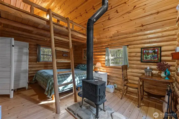 A small wood stove heats the bunkhouse easily.