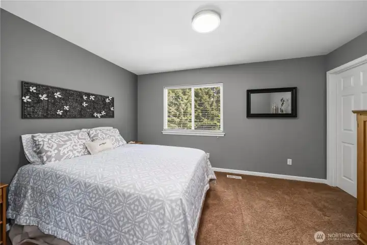 Bedroom with walk-in closet.