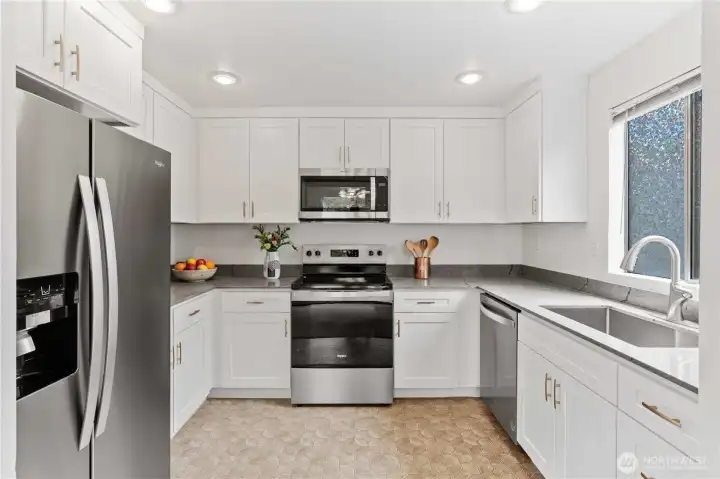 Unit D remodeled kitchen. Virtually staged. Unit D remodeled kitchen. Virtually staged.