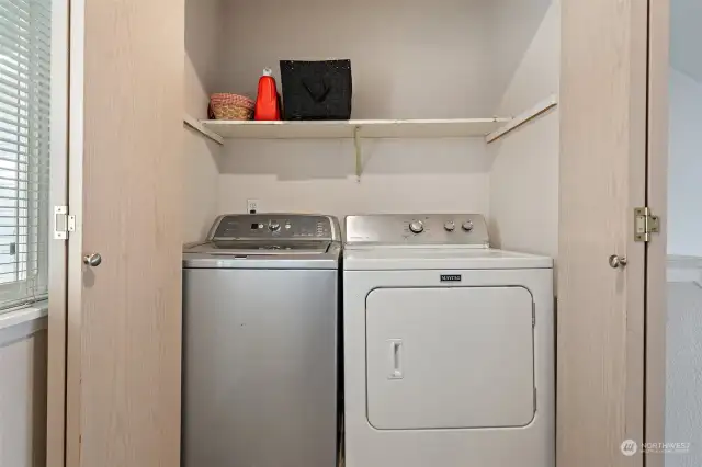 How nice to have the laundry room by the bedrooms!