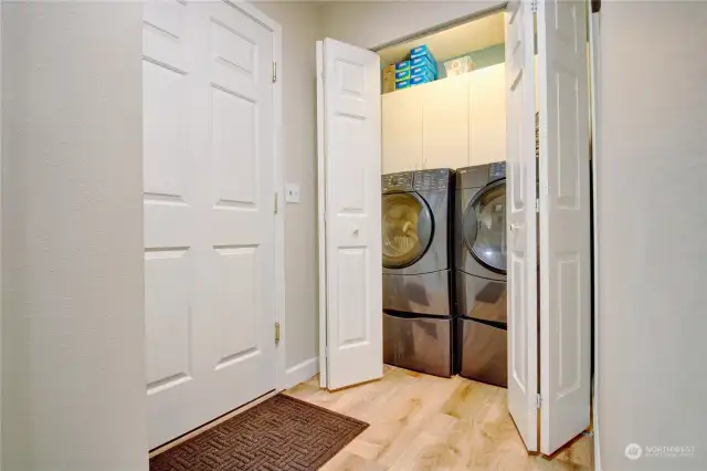 Washer and Dryer hookups leading to the garage