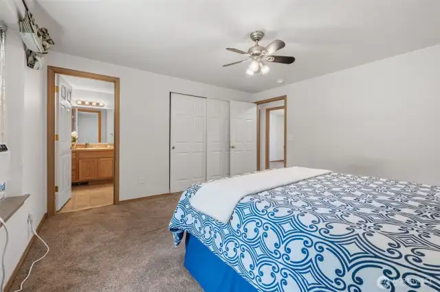 Primary bedroom and bathroom