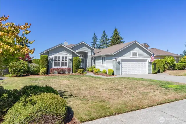 Mature well cared for landscaping both front and back.