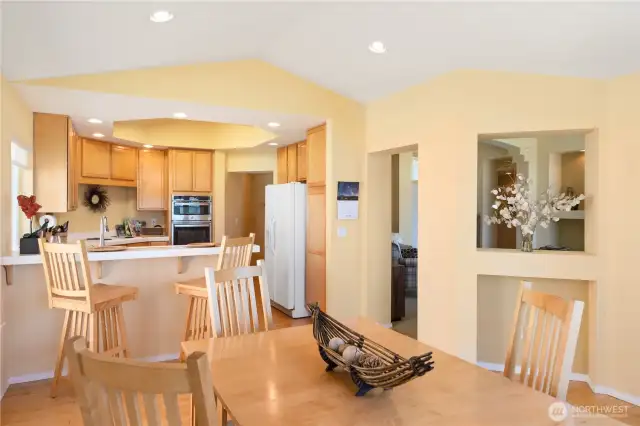 Dining is open to the well planned kitchen and has ample storage.