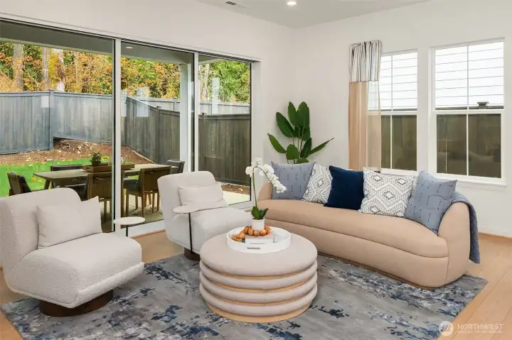 Great room with multi-stack doors to covered patio