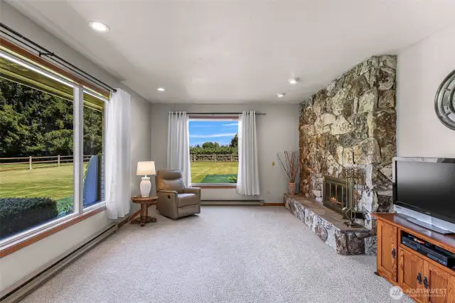 With a large picture window facing north, a great space to congregate around the warmth of the fire on cool days.