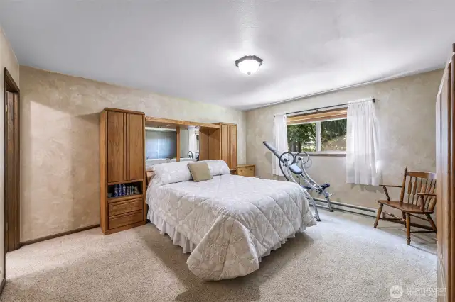 Nice sized primary bedroom, with a three quarter bath attached.