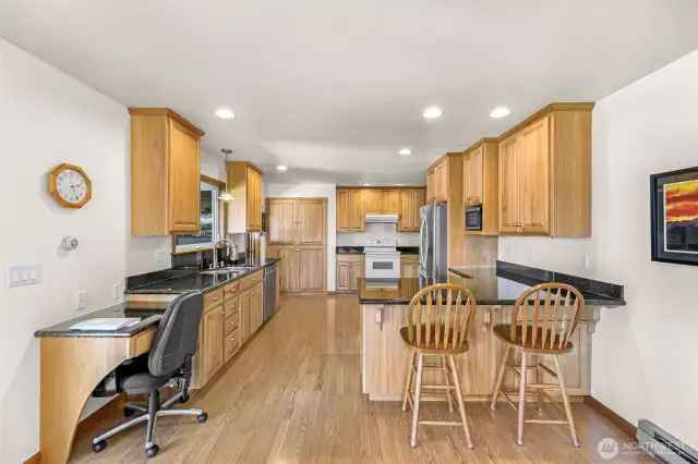 Wonderful open kitchen with bar seating
