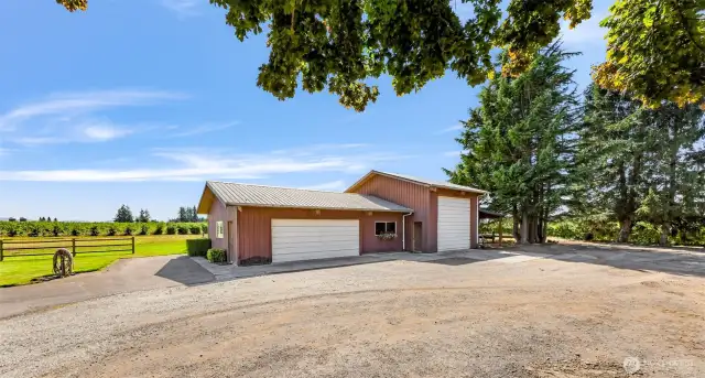 2 bay shop, plus extra RV storage, and covered parking next to it.