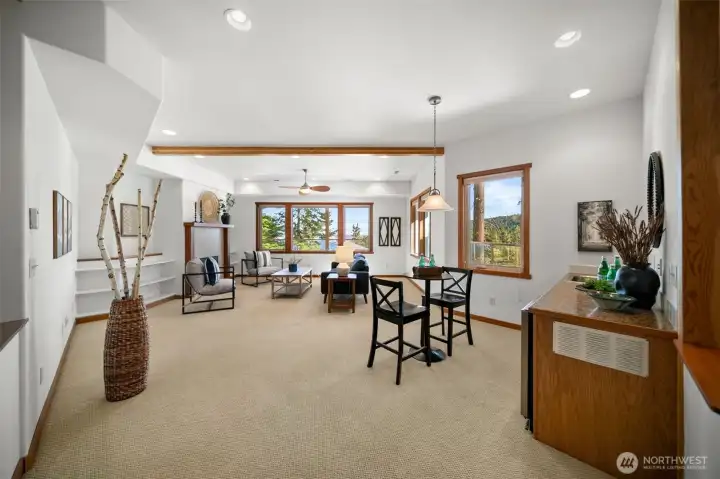 Spacious lower level family room with wet-bar