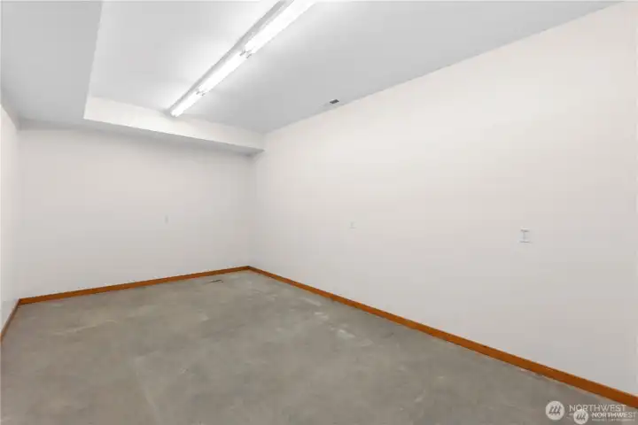 Extra garage space with heated floors in shop