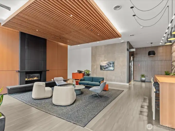 Welcoming lobby with  fireplace makes a great gathering space