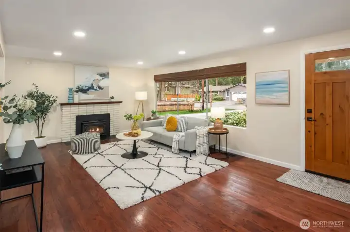 Warm wood floors, open floor plan, big windows!