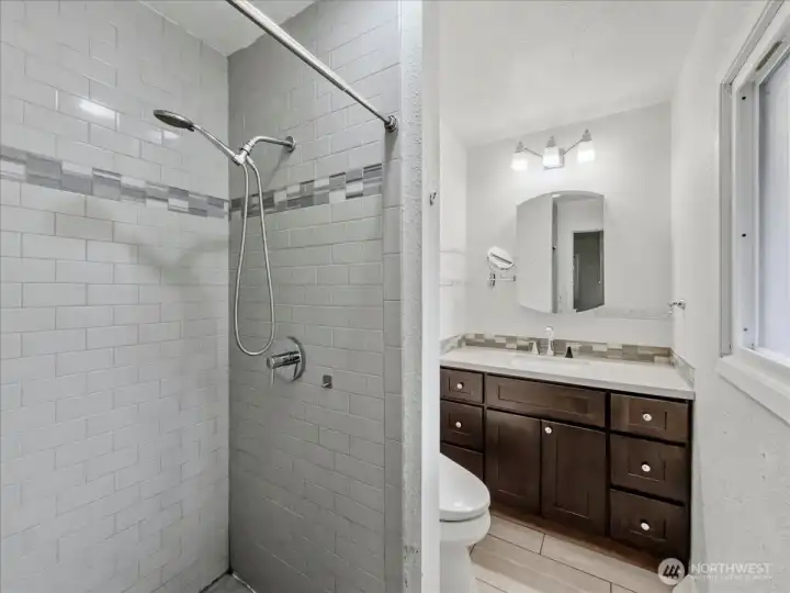 Primary bathroom with shower.