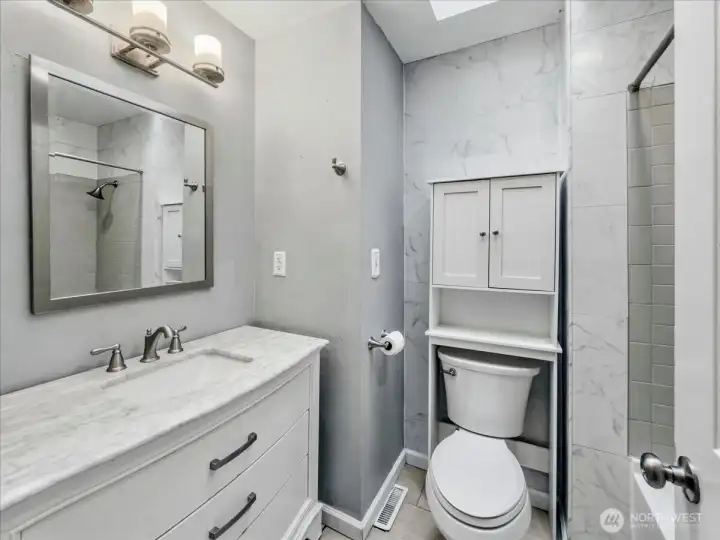 Casually updated full bathroom on the main.
