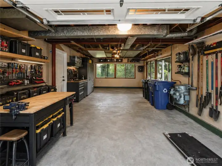 Deep, single car garage allows extra room for storage [virtually staged]