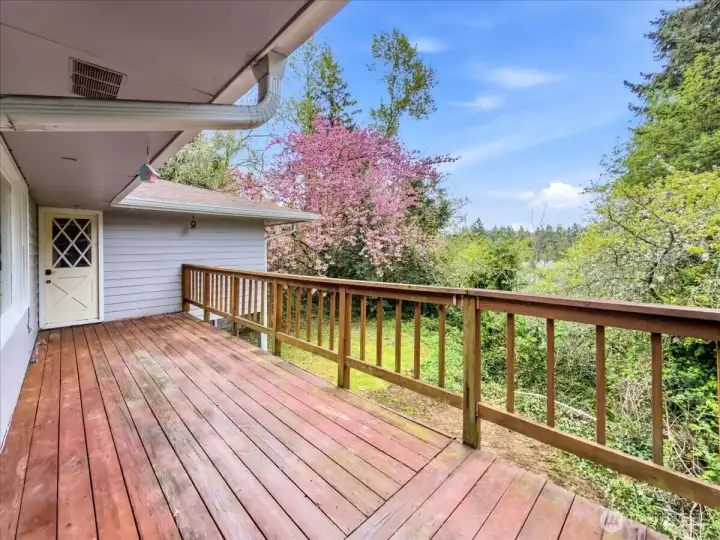 Wraparound deck with access from main living area and private bedroom wing (or guest wing/other)