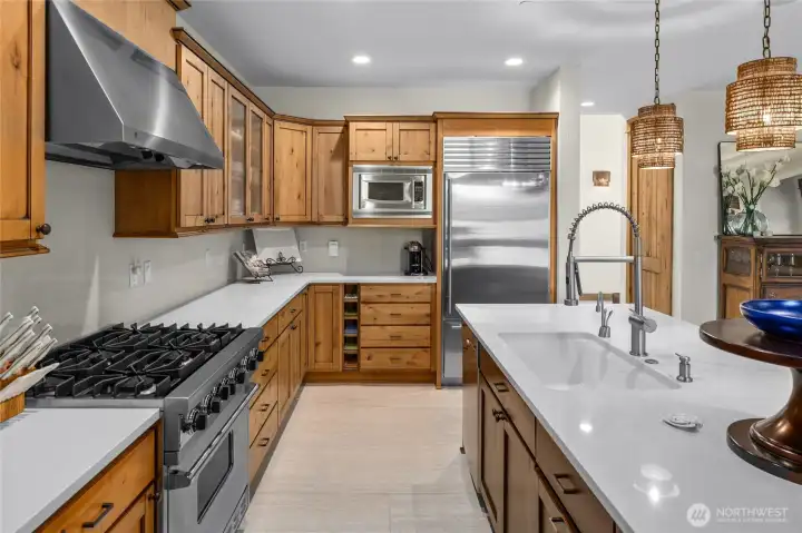 From the Viking range to the sweeping new countertops, this kitchen is made for memorable gatherings.