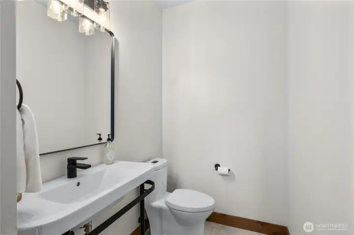 Powder Room on main floor with new sink and toilet.