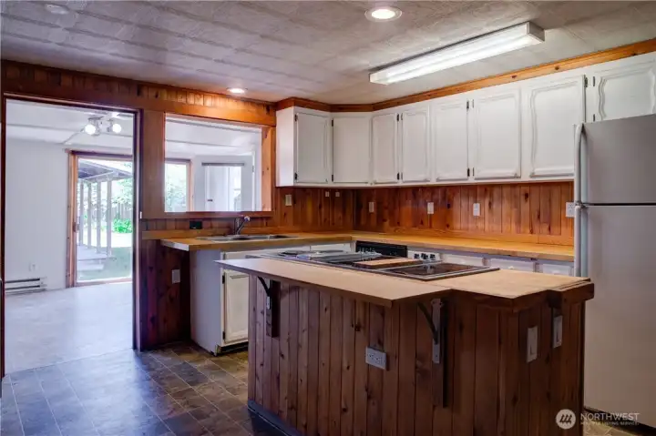 Kitchen looking into sunroom