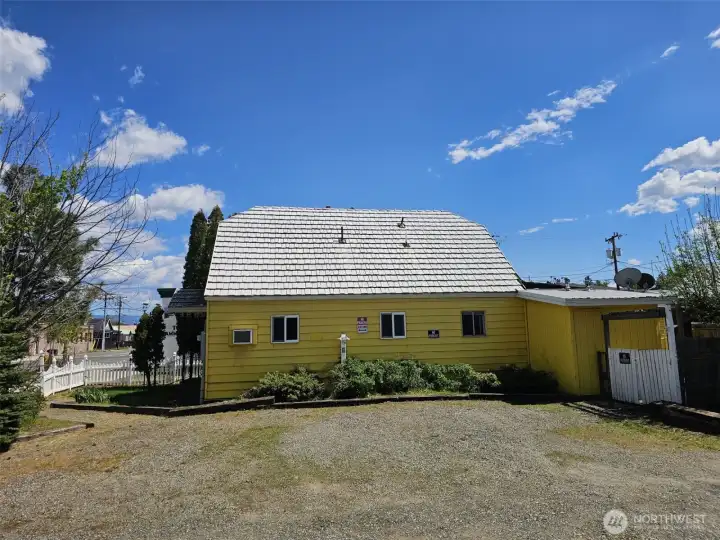 Ample parking space off back alley along west side of home, street parking off 1st Street too