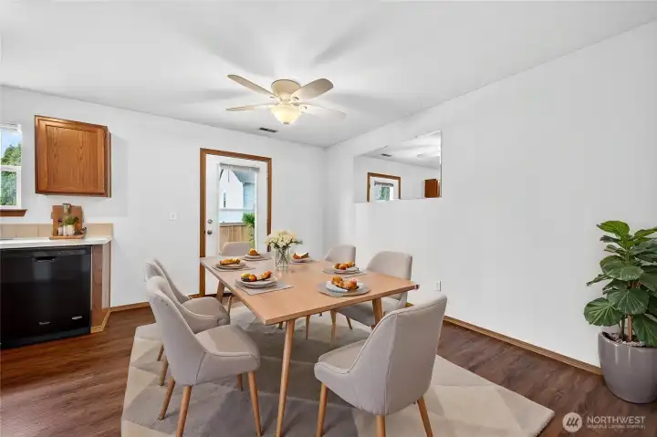 Virtually staged view of the dining room.