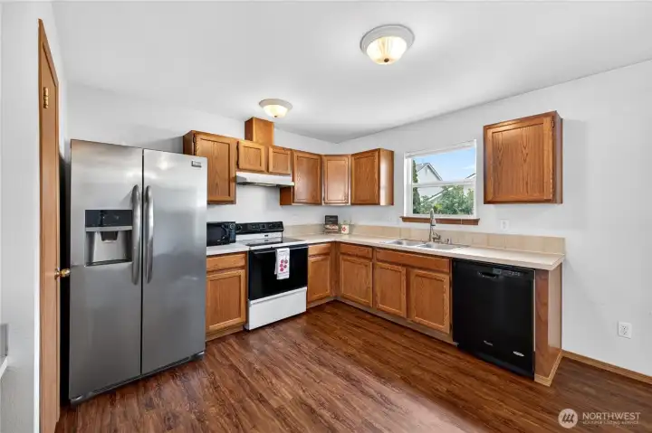 Additional view of the kitchen.