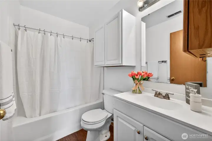 Updated main bathroom with modern finishes, offering both style and functionality.