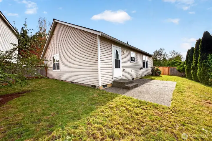 Enjoy a fully fenced and beautifully landscaped yard with a patio—ideal for relaxing evenings, playtime, or outdoor entertaining.