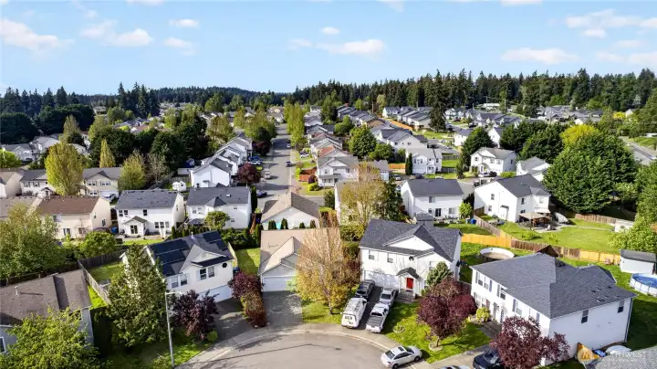 Birds eye view of the home and street.
