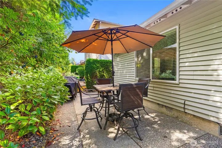 The patio area adjoins a greenbelt, offering exceptional privacy.