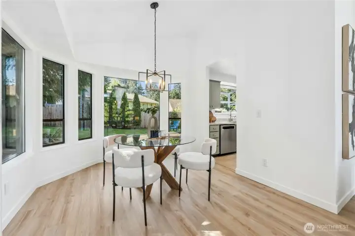 Nice sized dining room just off the kitchen and living room with views of the private rear yard.