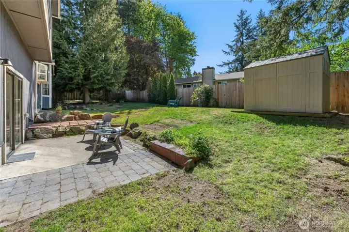 Large rear yard with patio
