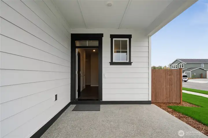 Large covered front porch. Photo is representational. Actual home for sale is under construction and colors, finishes, and materials will vary. See site agent for details.