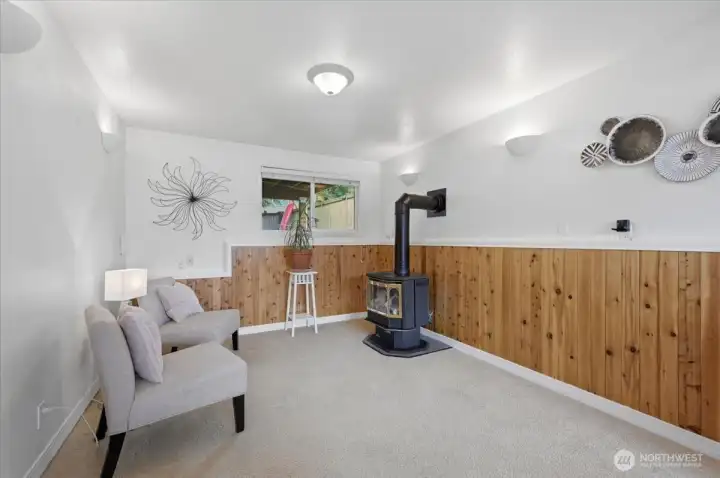 Lower family room with gas fireplace