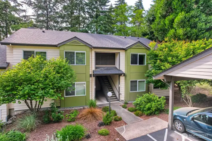Notice the well groomed landscaping and your carport space, just a short distance to your door