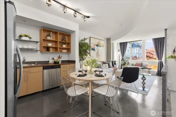 Spacious open floor plan with large windows for natural light