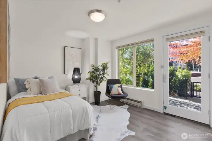 Lower level bedroom leads to private patio