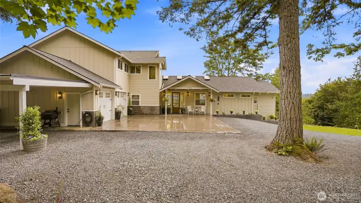 Zero-step entry at the front door and garage entrance to the house.