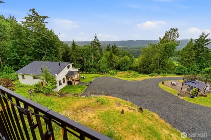 Looking from the main house down to the second house and the sports court. And of course, the view!