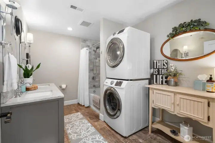 Second home bathroom with laundry room.