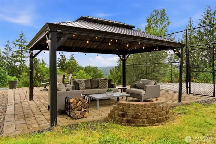 The Gazebo with firepit next to the sports court.
