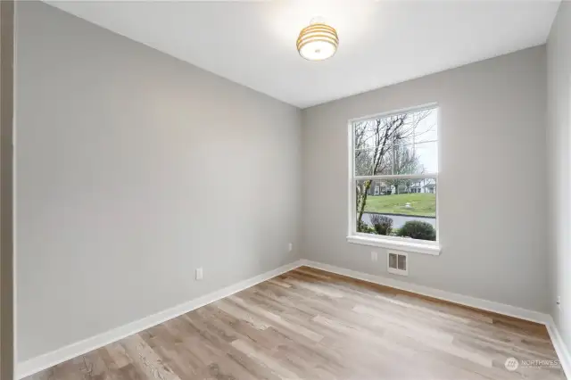 Large 2nd bedroom, overlooking the center lawn.