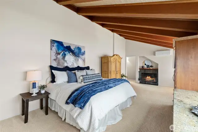 Primary bedroom with panoramic views of the Puget Sound